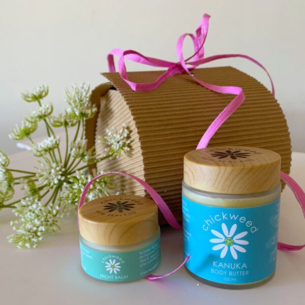 Chickweed Gift Box - cardboard box with pink ribbon containing a pot of balm and a body butter